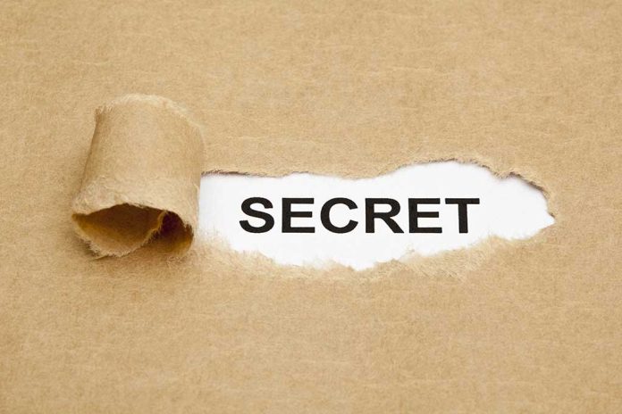 The,Word,Secret,Appearing,Behind,Torn,Brown,Paper.