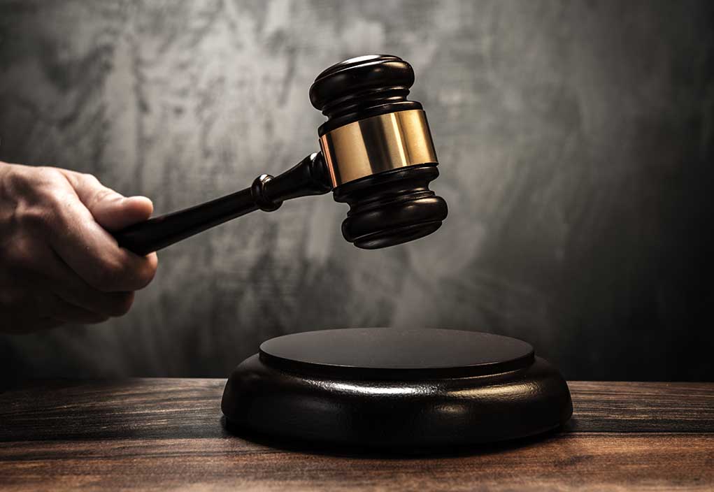 Judge's,Holding,Wooden,Hammer