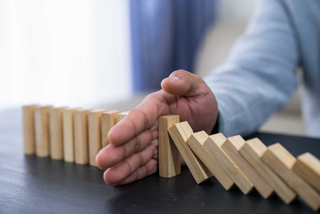 Stopping,The,Domino,Effect,Concept,For,Business,Solution,,Strategy,And