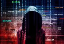 Hooded figure with cybersecurity-related words and binary code.