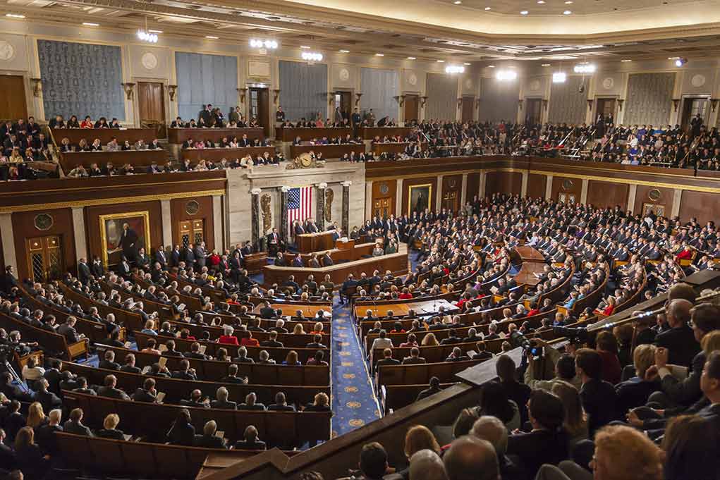492045133 featured image Large assembly in a government legislative chamber.