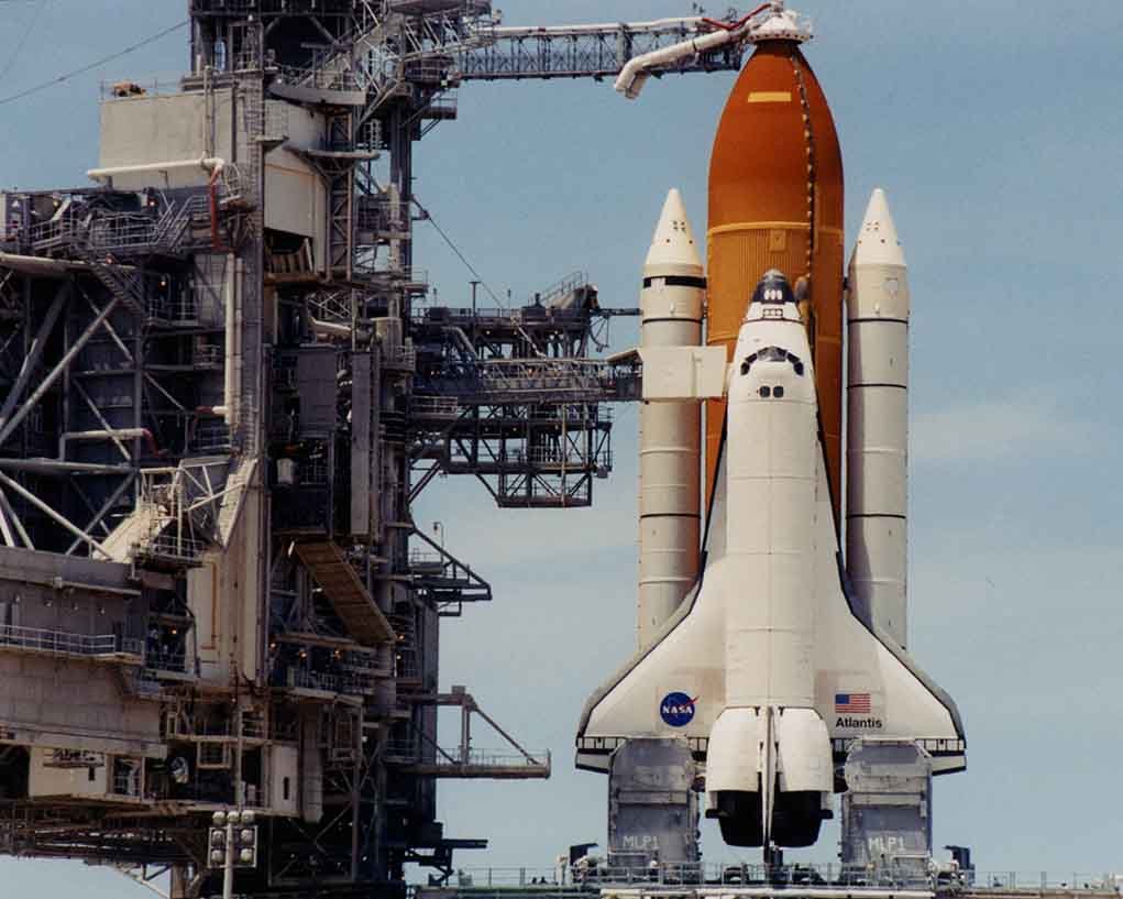 132394 featured image Space shuttle on launch pad with support structure.
