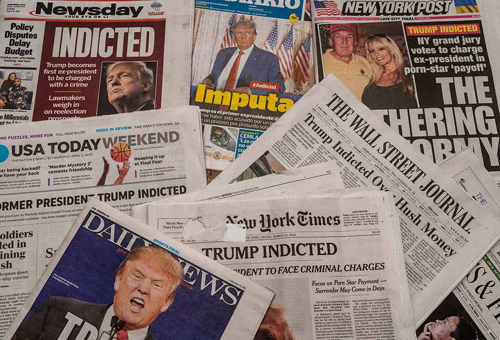 2282847273 featured image Newspaper headlines about Trump indictment and charges.