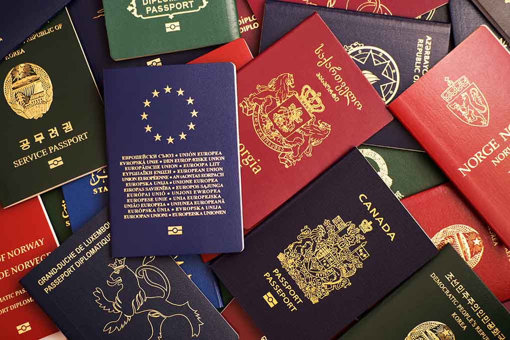 1367373428 featured image Various colorful international passports spread out.