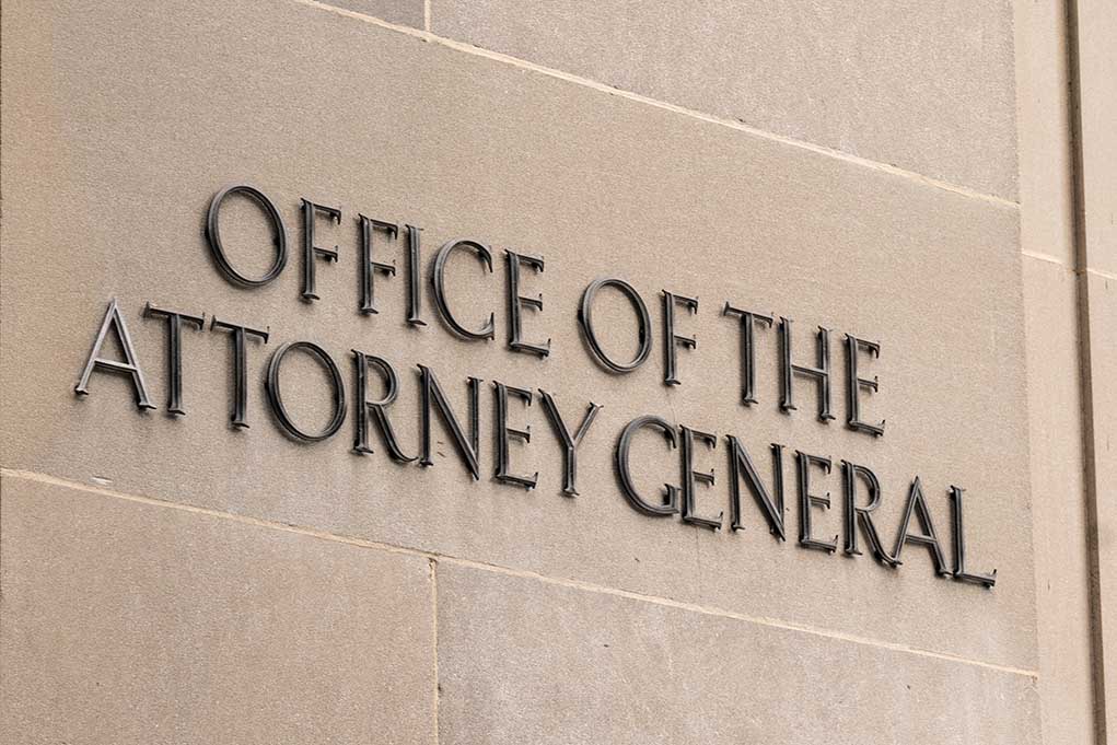 693016693 featured image "Office of the Attorney General" sign on concrete wall.