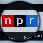 Magnifying glass over NPR logo on screen
