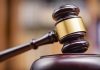 Judges gavel on a wooden block courtroom setting