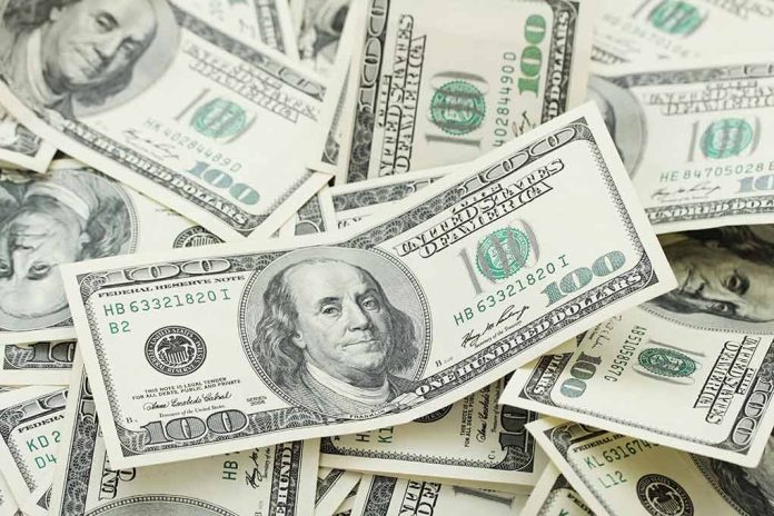 150954545 featured image Pile of US hundred dollar bills