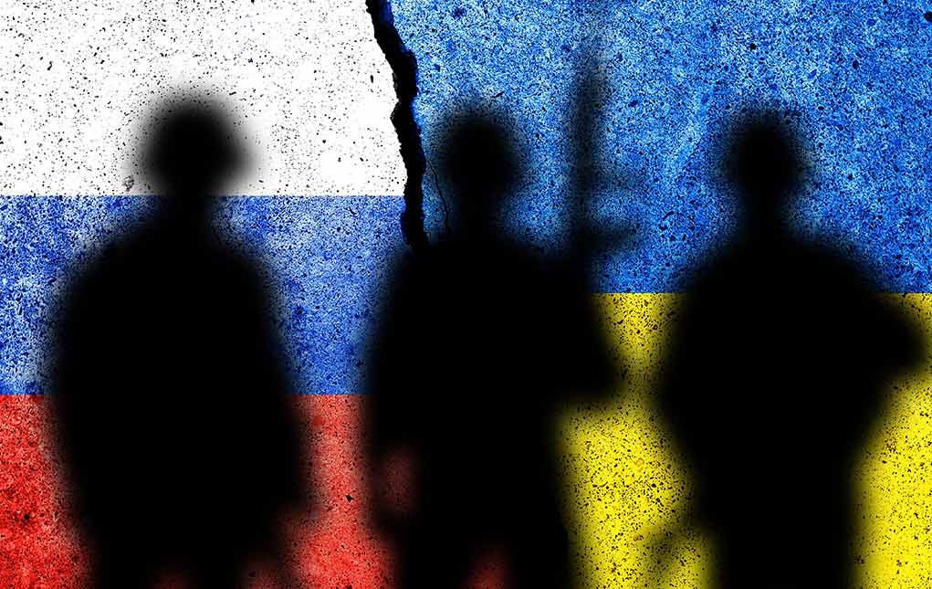 How Ukraine’s Detention of Chinese Nationals Impacts Global Alliances Amidst Conflict Three soldier silhouettes against split Russia Ukraine flags