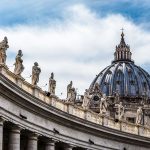 Large dome with statues on curved building