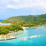 Tropical bay with turquoise water and lush hills