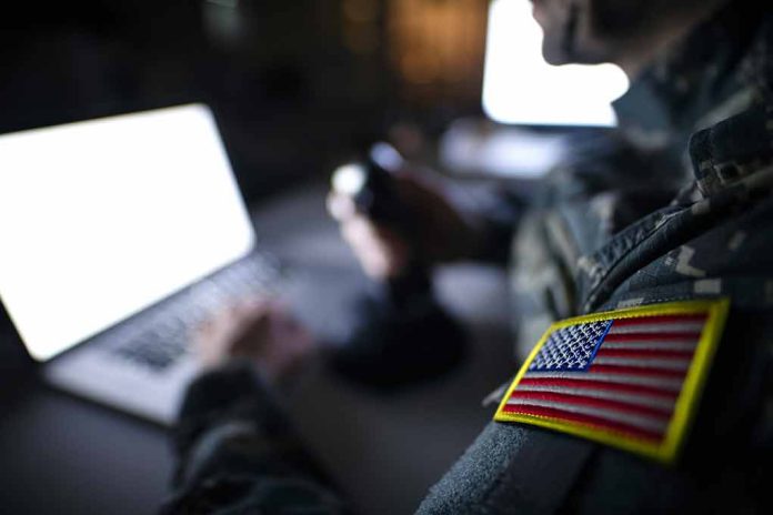 1395036650 featured image Soldier using laptop with US flag patch visible