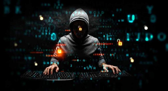 1480095632 featured image Hacker in hoodie using computer with digital code background.