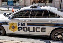 FBI police car parked on city stret
