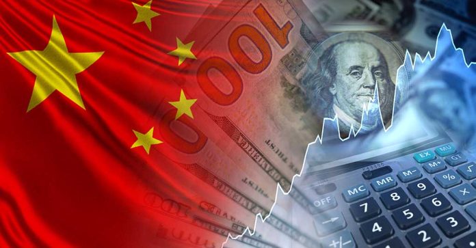 1716113218 featured image China flag dollar bills calculator financial chart