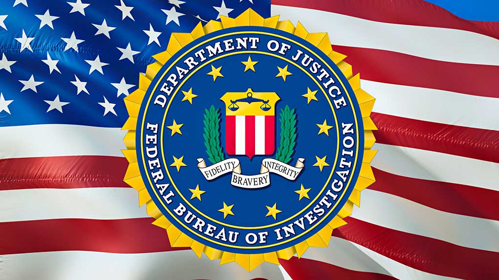 FBI seal on an American flag background