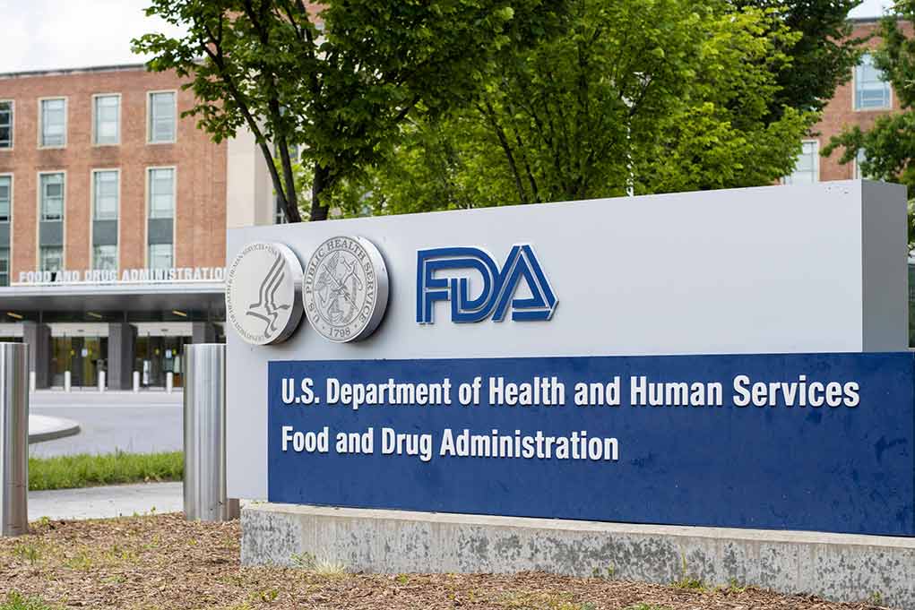 2186128561 featured image FDA building entrance with department sign and trees