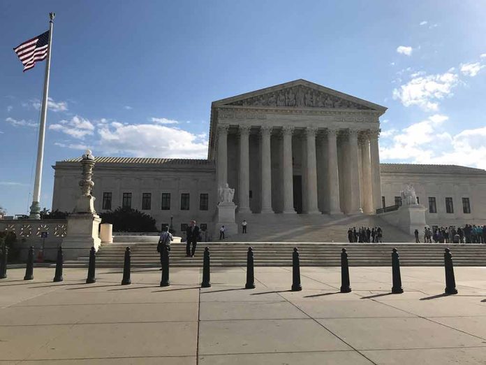 U S Supreme Court Building with flag and people outside