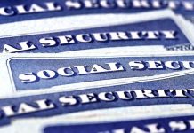 Blue Social Security cards piled together