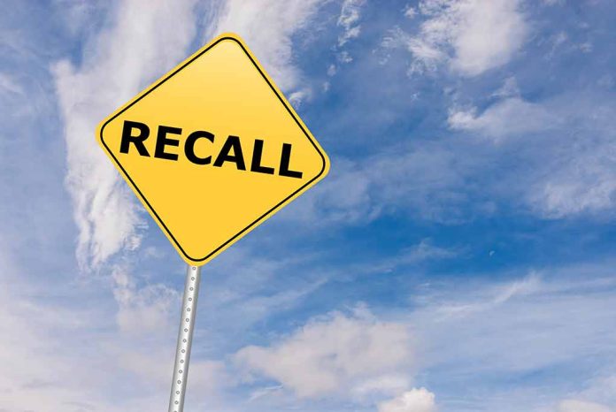 529192612 featured image Yellow Recall road sign against a cloudy sky