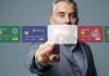 Man interacting with virtual credit card interface