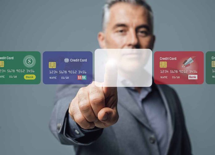 737497186 featured image Man interacting with virtual credit card interface