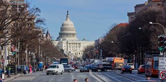 People crossing street near the U S Capitol building