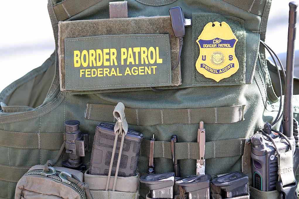 1646704639 featured image Border Patrol vest with gear and communication equipment