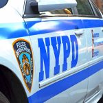 NYPD police car with logo and text