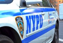 NYPD police car with logo and text