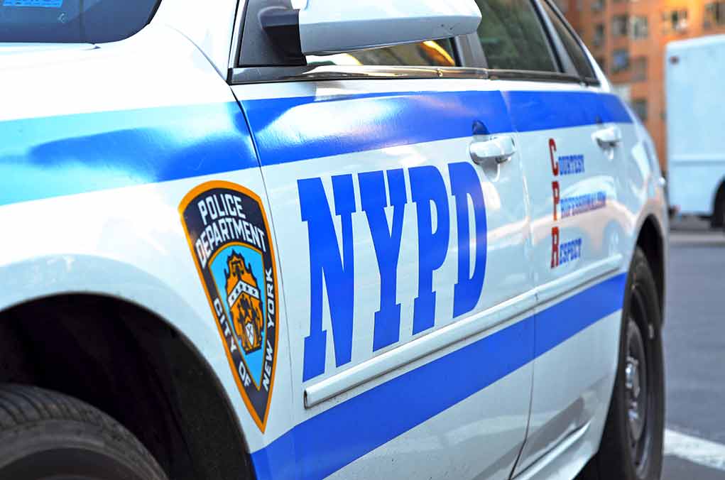 NYPD police car with logo and text