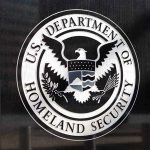 U S Department of Homeland Security emblem on wall