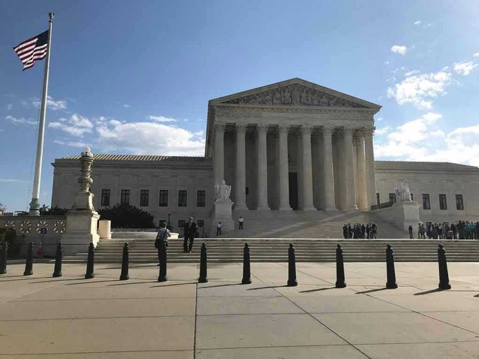 Supreme Court building with flag and people outside