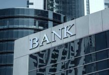 Bank building with reflective glass windows.