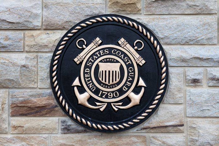 shutterstock_195060344.jpg Bronze emblem of the United States Coast Guard mounted on a stone wall