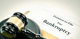 Gavel on bankruptcy petition document