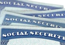 Several Social Security cards stacked together