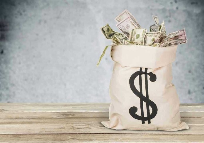 267762047 Bag of money with dollar sign.