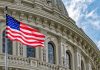 US flag in front of Capitol building
