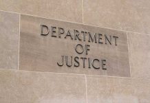 Department of Justice sign on a building