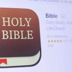 Icon of a Bible app featuring a brown book with HOLY BIBLE text
