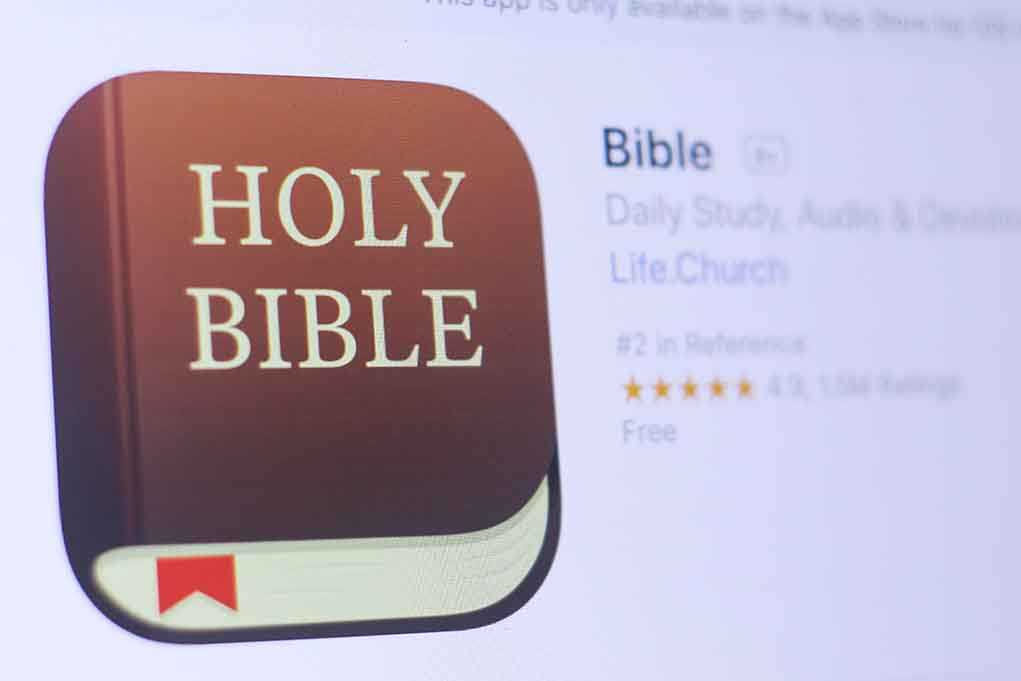 Icon of a Bible app featuring a brown book with HOLY BIBLE text
