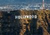 SHOCKING Layoff Wave Hits HOLLYWOOD – 2,000 Affected! The Hollywood sign on a hillside.