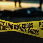 Police Find Body After Husband LIES Police tape marking a crime scene at night.