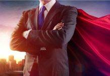 SNAP MELTDOWN — HERO FILLS IN THE GAPS! Businessman wearing a cape, standing confidently.