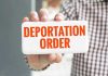 Congress’ $170 Billion ICE Move—How This Translates to DEPORTATIONS Hand holding sign with Deportation Order text.
