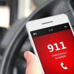 911 Horror Unfolds — Murdering Cop CONVICTED A smartphone displaying the emergency number 911 while held in a persons hand inside a car