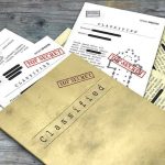 High-Stakes Drama: Epstein’s Elite Ties Exposed Classified documents with Top Secret stamps on wooden surface.