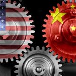 China Panic: Trump’s Chip Deal Upends Tech Power Interlocking gears with USA and China flags.