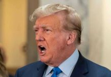 Conservative Panic—Trump Warns “Survival at Stake” Man in suit with open mouth, speaking passionately.